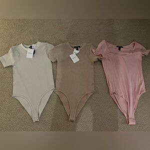 Forever 21 Womens Ribbed Short Sleeve Bodysuits in Cream, Brown, Pink - Set of 3
